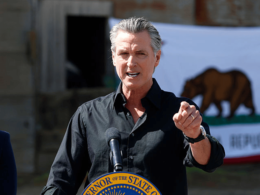 CERES, CALIFORNIA - APRIL 16: California Governor Gavin Newsom (R) speaks as California At
