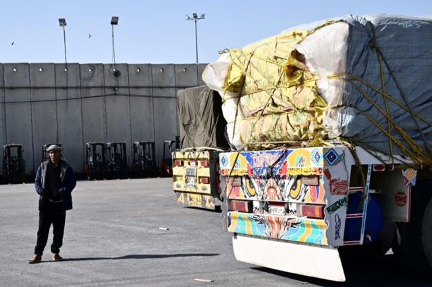 Egyptian drivers carrying aid to Gaza wait for hours at a recently reopened border crossing