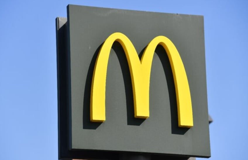 Although profits edged higher, McDonald's executives pointed to a continued drag in sales