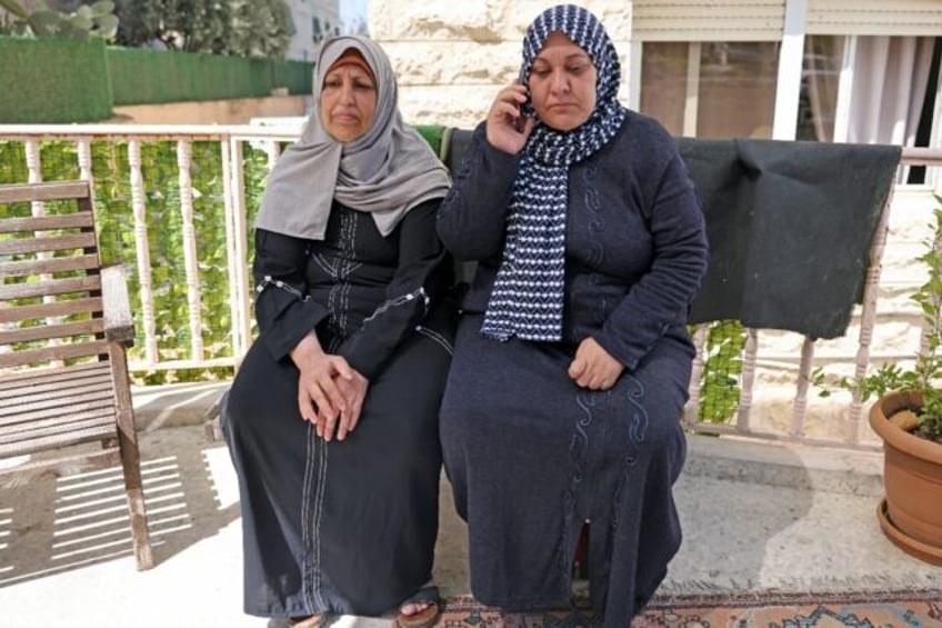 Palestinians Rim Abu Obeida (L) and Manal Abu Shaaban are waiting anxiously to learn if th