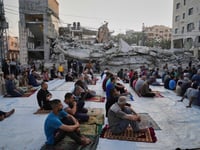 Gaza marks the start of Eid with outdoor prayers amongst the rubble and food growing ever scarcer