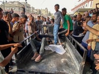 Gaza rescuers say Israel army kills more than 50 people near aid site