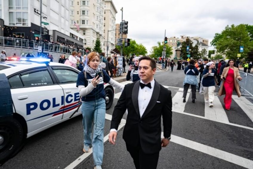 Pro-Palestinian protestors confront guests arriving at the 2024 White House Correspondents