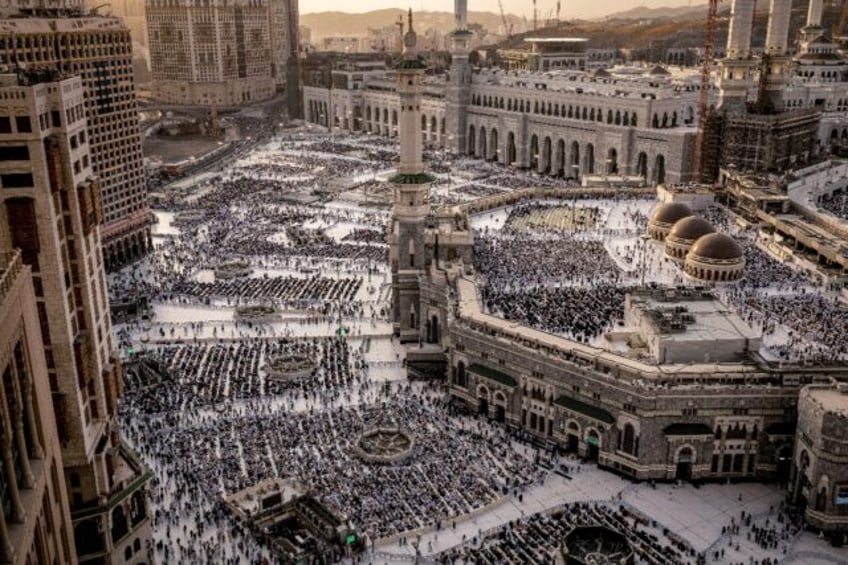 Muslim worshippers walk at the Grand Mosque in Saudi Arabia's holy city of Mecca