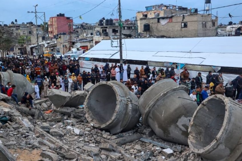 Gazans at Eid morning prayers at the flattened Al-Farooq mosque in Rafah