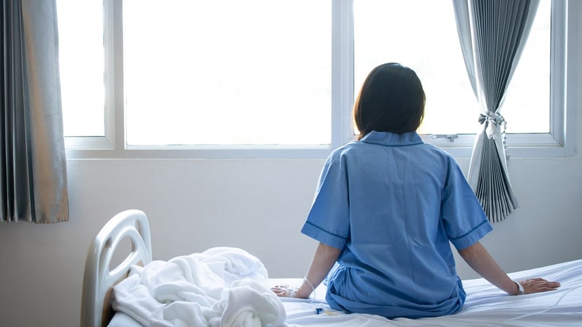 Patient in hospital bed