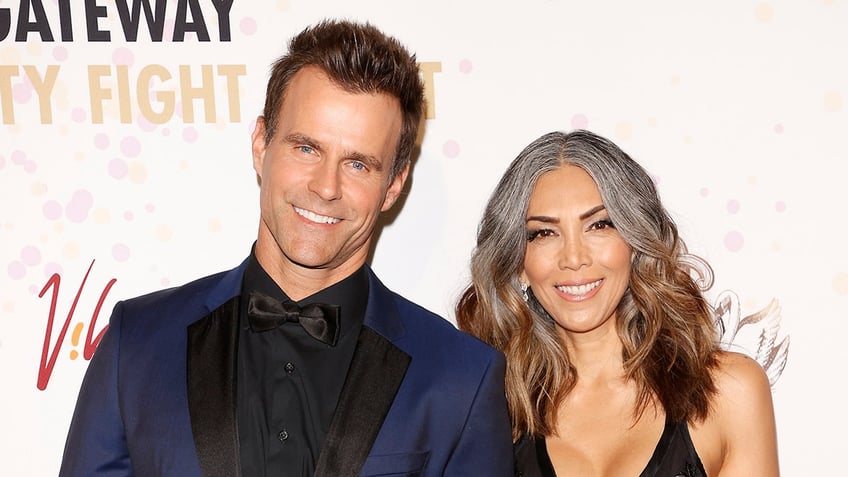 Cameron and Vanessa Mathison pose on the red carpet at Celebrity Fight Night.