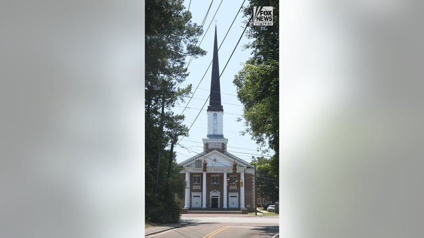 People attend a funeral a church for Johnny Wactor