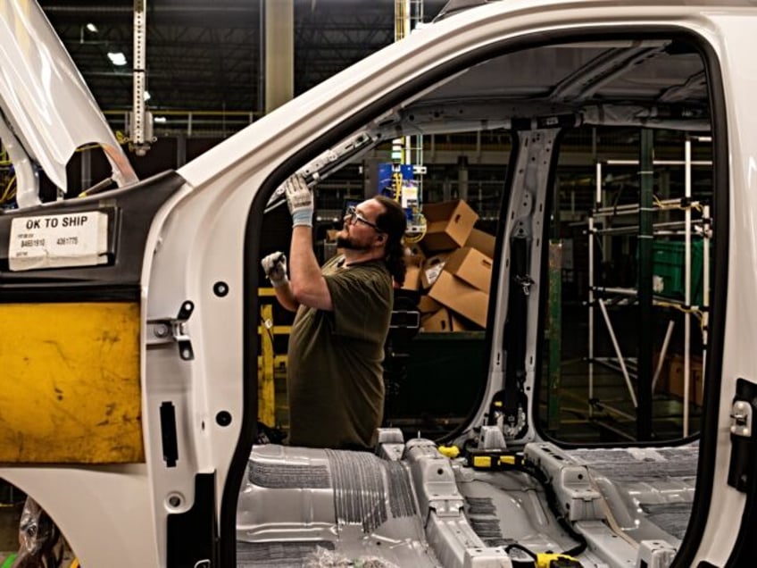 A worker on the trim assembly line at the General Motors assembly plant in Fort Wayne, Ind