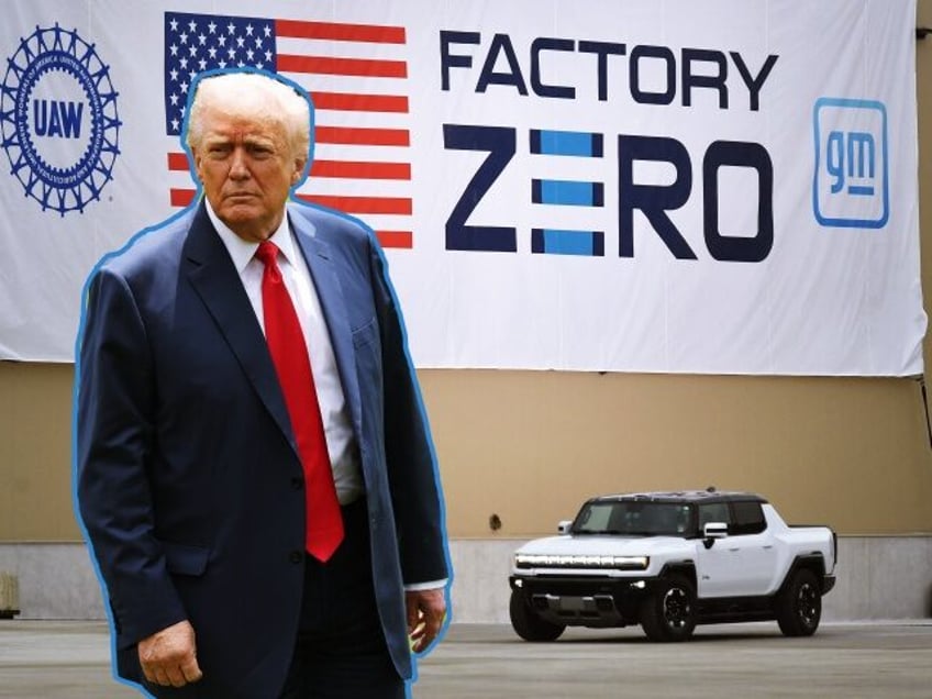 US President Joe Biden test drives a GMC Hummer EV as he tours the General Motors Factory