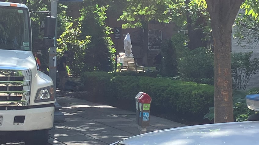 The George Washington statue covered up