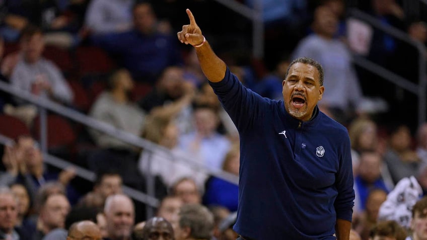 Ed Cooley reacts during a game