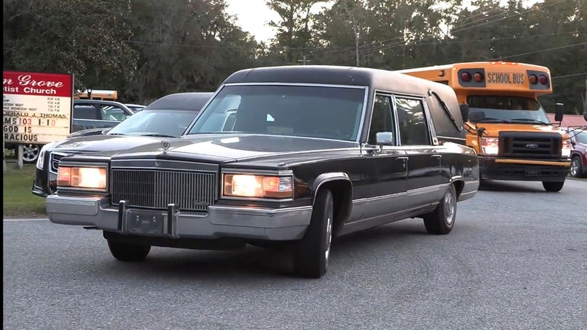 Hearse pulls up to GA gangway collapse location