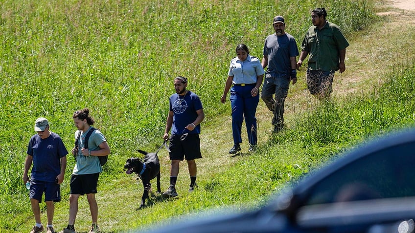 People leave Apalachee High School after a shooting