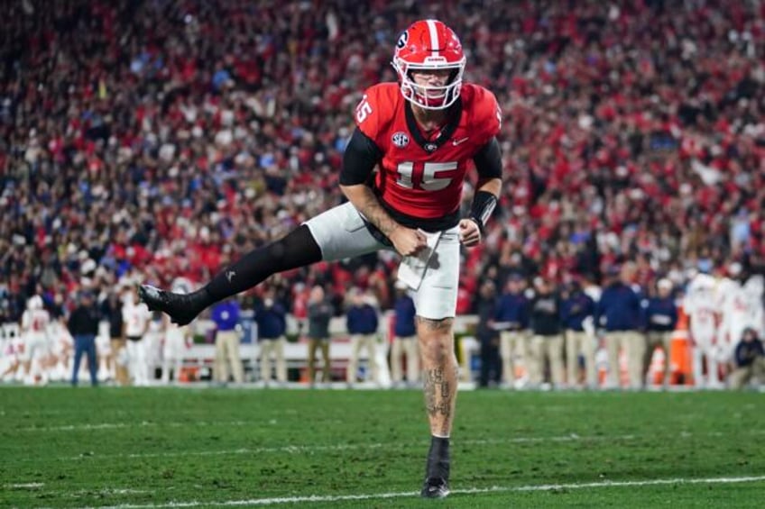 georgia jumps to no 1 in cfp rankings past ohio state michigan and florida state remain in top 4