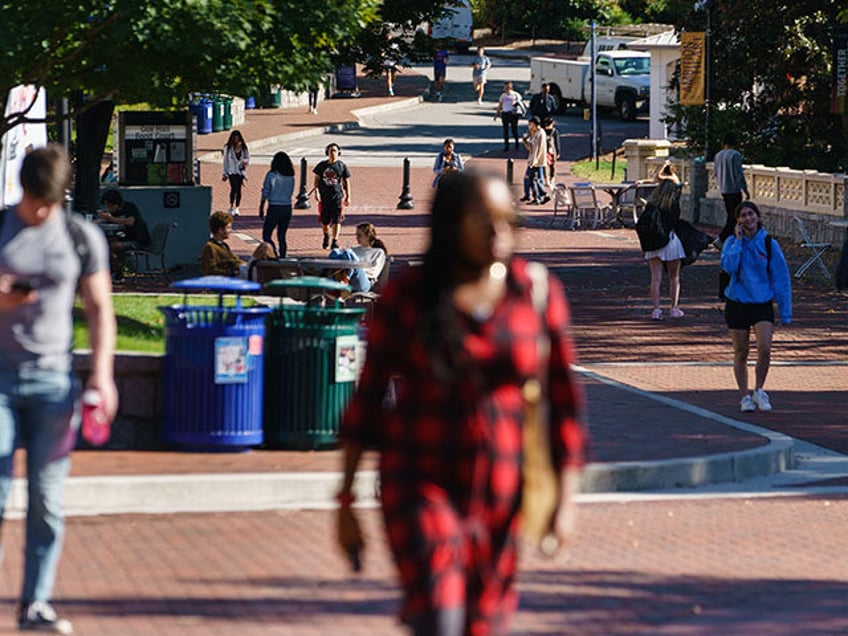 Young people are seen on the Emory University campus in Atlanta, Georgia on October 14, 20