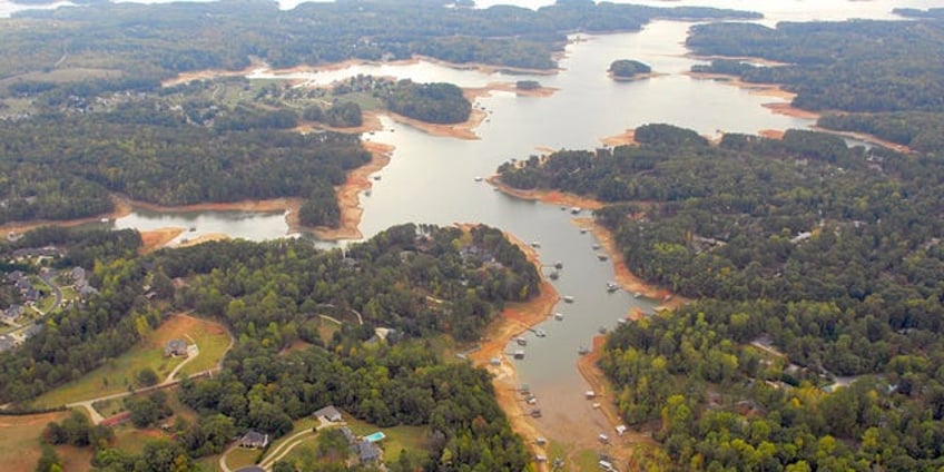 georgia reservoir claims third life in past week as body of missing swimmer 27 recovered in lake lanier