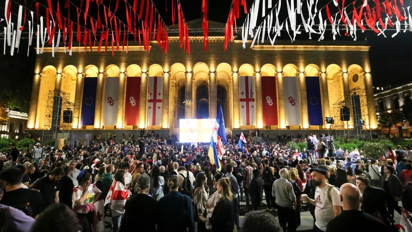 Demonstrators gather at the Parliamentary building during an opposition protest against the foreign influence bill in Tbilisi, Georgia