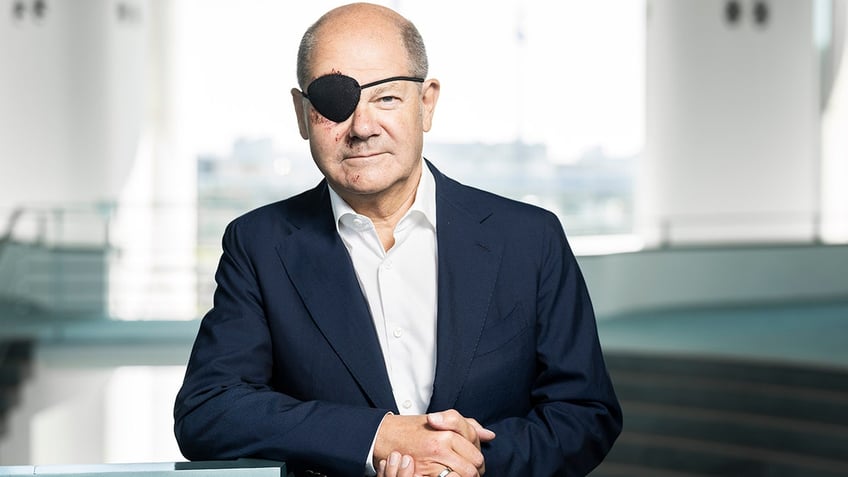 german chancellor olaf scholz shows off photo with eye patch following jogging accident