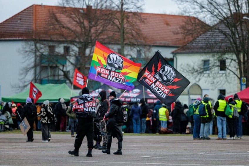 Demonstrators protesting against Germany's far-right Alternative for Germany (AfD) party c