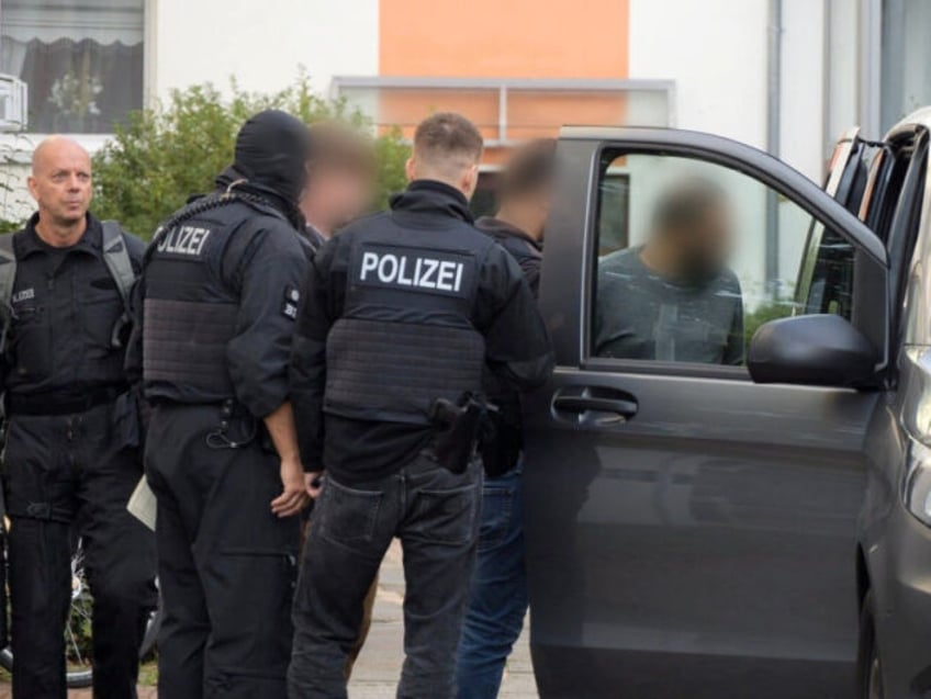 german police launch nationwide raids against migrant smugglers