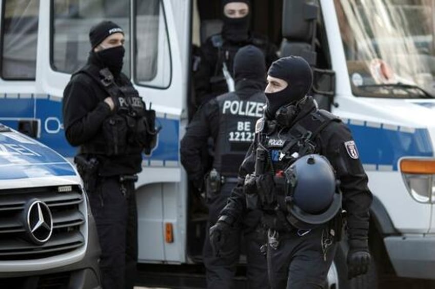 german police raid 170 homes over hate speech insults to politicians