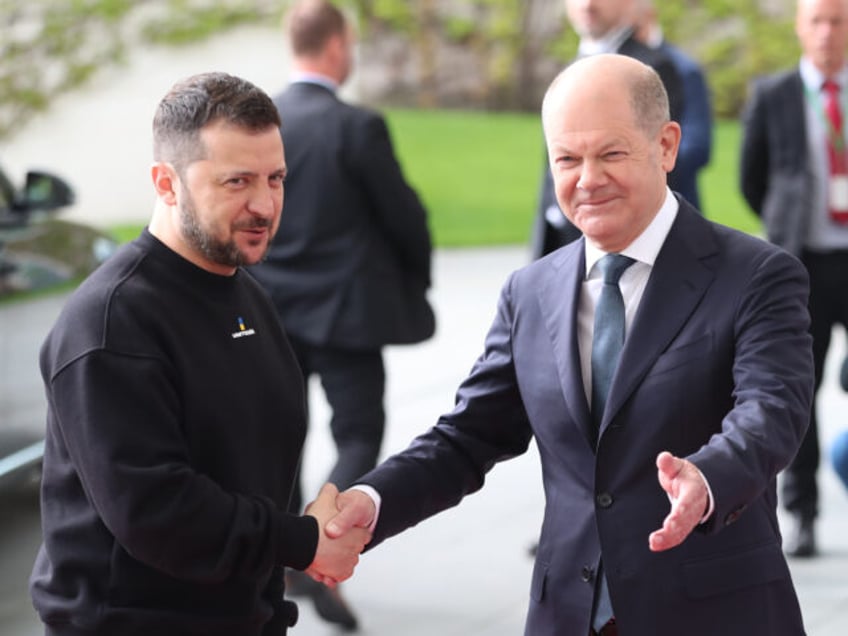 BERLIN, GERMANY - MAY 14: Ukrainian President Volodymyr Zelenskyy (L) is welcomed by Olaf Scholz (R), the German Chancellor with an official ceremony in Berlin, Germany on May 14, 2023. (Photo by Cuneyt Karadag/Anadolu Agency via Getty Images)