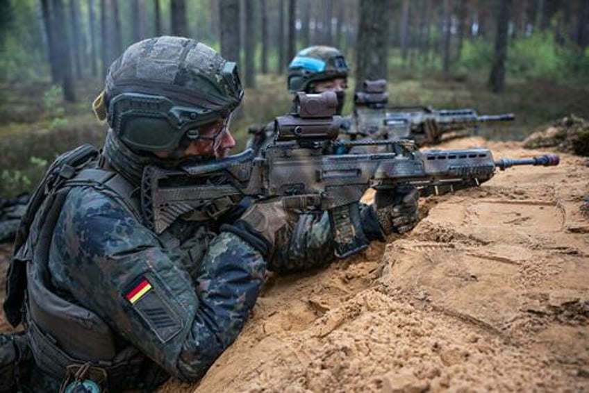 germany deploys permanent troops to lithuania as russian offensive builds