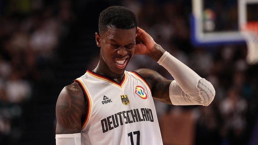 germany head coach tries to grab raptors dennis schroder in heated altercation at fiba world cup