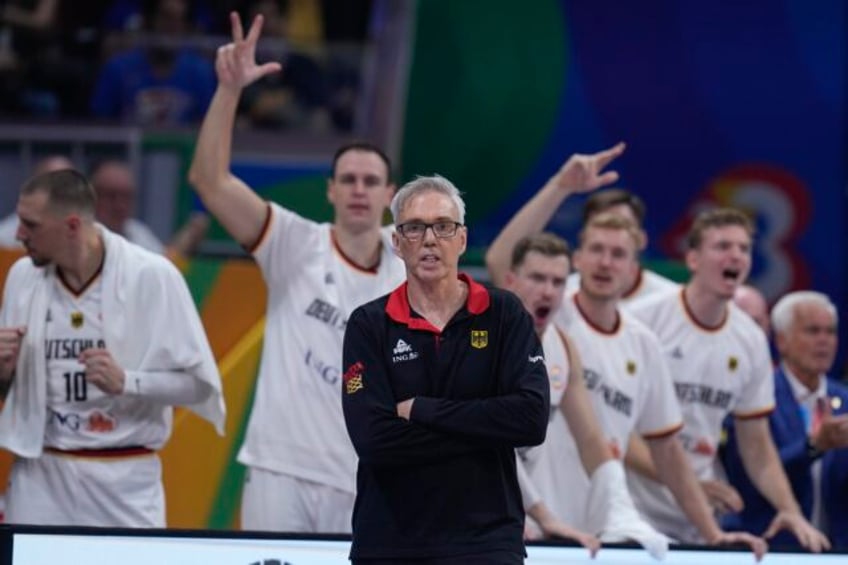 germany holds off latvia and will next play the usa in the basketball world cup semifinals