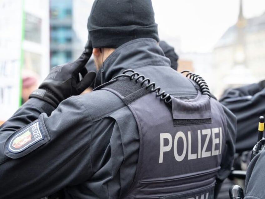 A german policeman at a protest in Bonn, Germany.