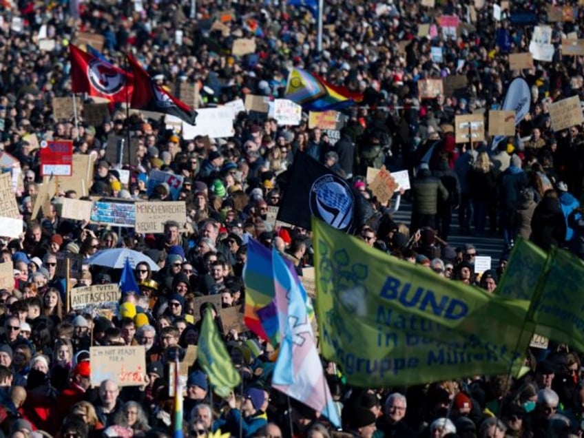 08 February 2025, Bavaria, Munich: Numerous people take part in a rally against right-wing