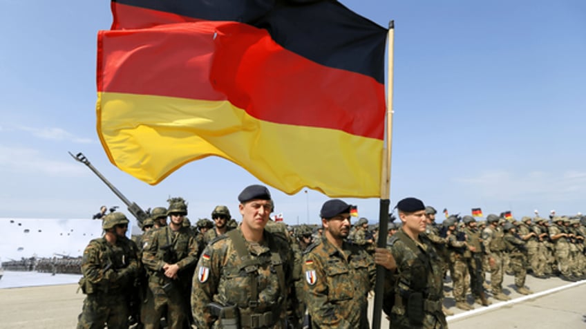 germany reverses course on pledge to meet nato military spending target