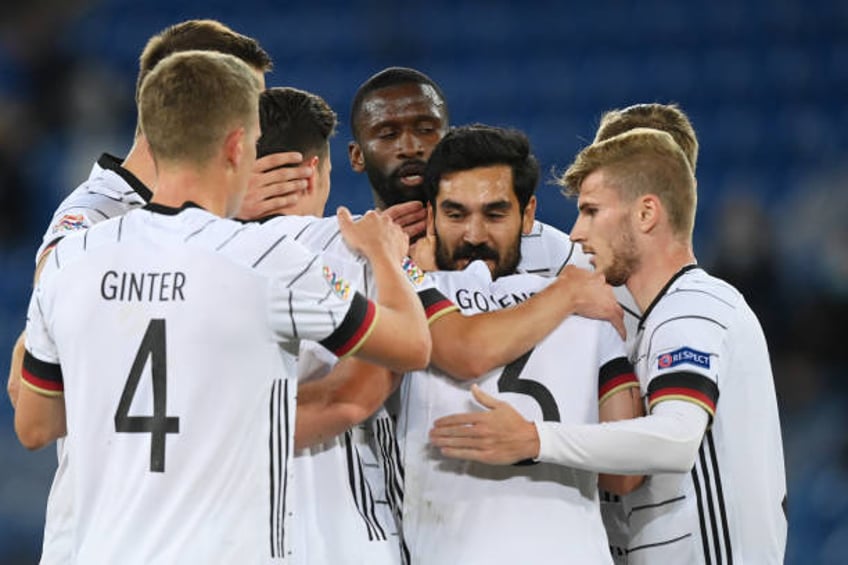 Ilkay Guendogan of Germany celebrates his team's first goal with teammates during the UEFA Nations League group stage match between Switzerland and...