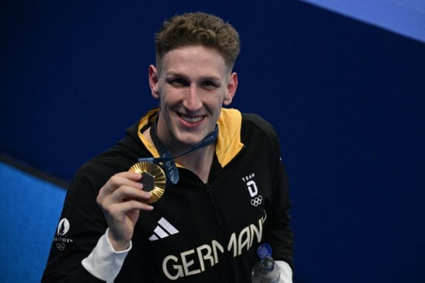 Germany's Lukas Maertens poses with his medal after winning the 400m freestyle gold