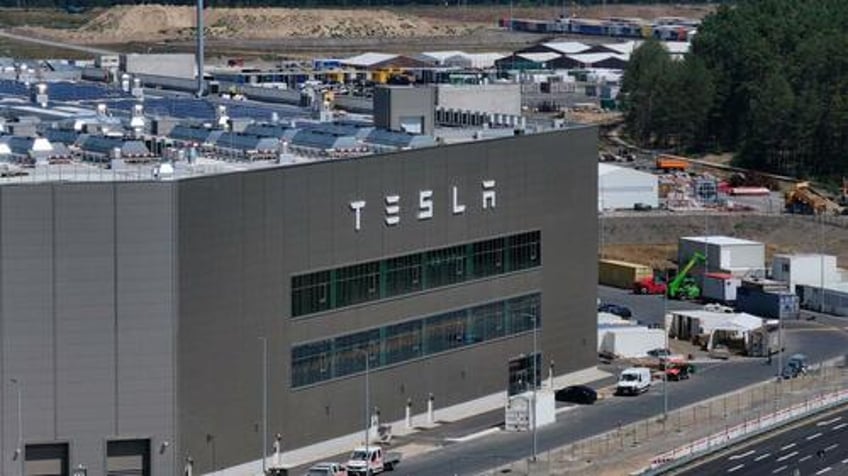 germanys sick pay dilemma tesla dangles cash for workers to show up as absences skyrocket