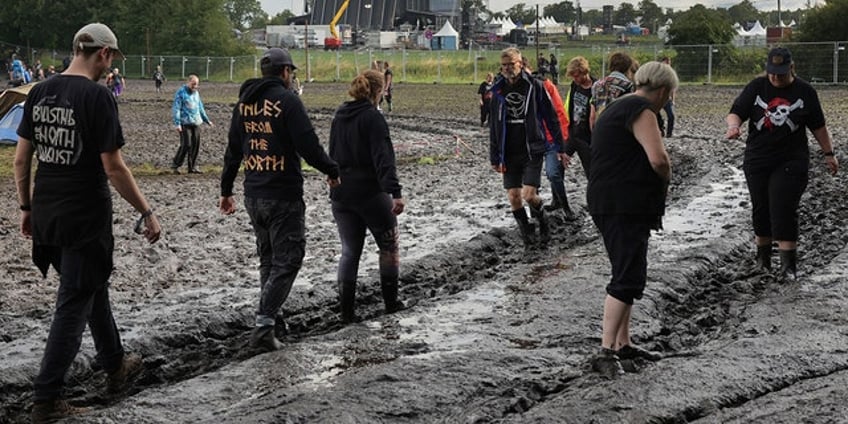 germanys wacken open air heavy metal festival opens at reduced capacity due to persistent rain