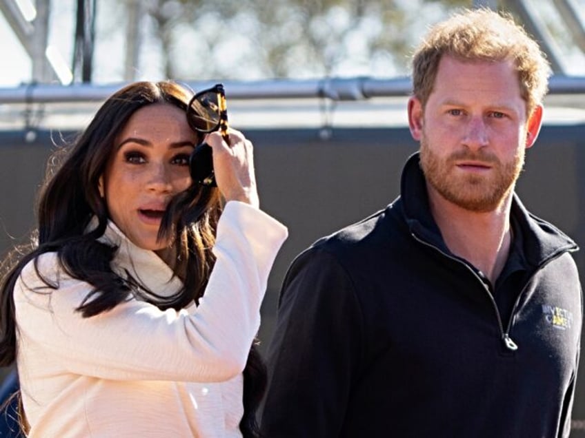 FILE - Prince Harry and Meghan Markle Duke and Duchess of Sussex visit the track and field event at the Invictus Games in The Hague, Netherlands, Sunday, April 17, 2022. The production company founded by Prince Harry and his wife, Meghan, are splitting ways with Spotify, Friday, June 16, 2023, …