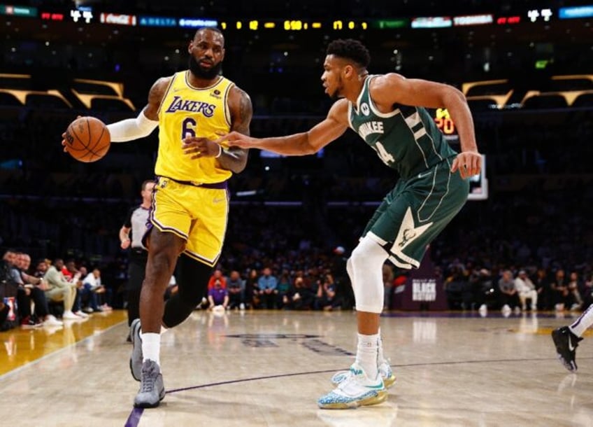 LeBron James, left, of the Los Angeles Lakers and Giannis Antetokounmpo, right, of the Milwaukee Bucks were the top vote-getters in the first fan voting update for the 2024 NBA All-Star Game announced by the league