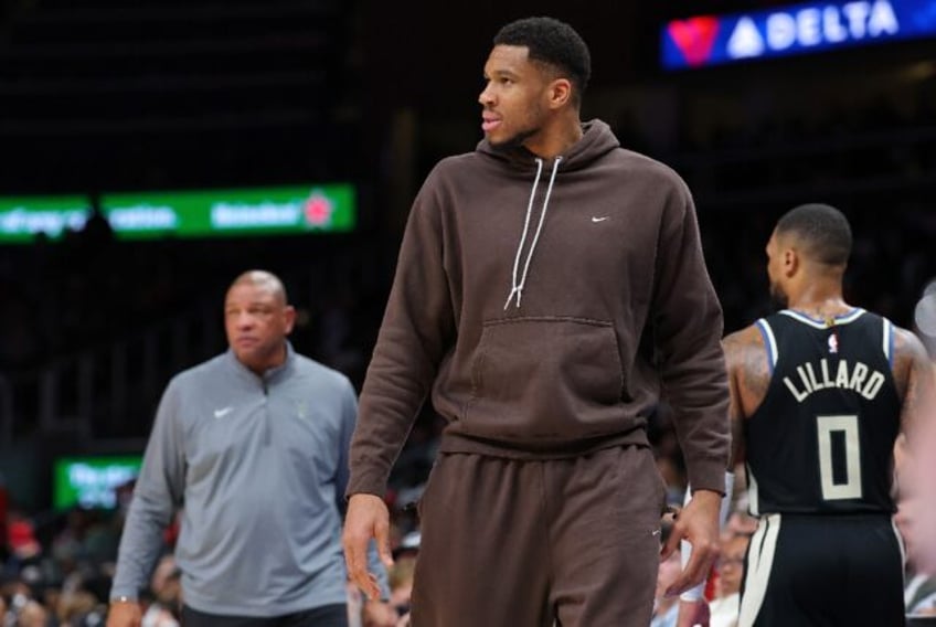 Greek forward Giannis Antetokounmpo of the Milwaukee Bucks, reacting to a referee call, wi