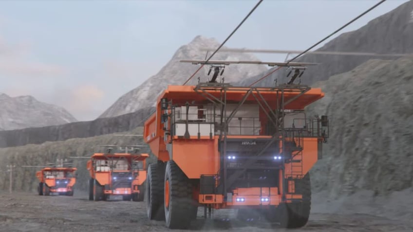 Giant battery-powered dump truck dumps diesel for electric