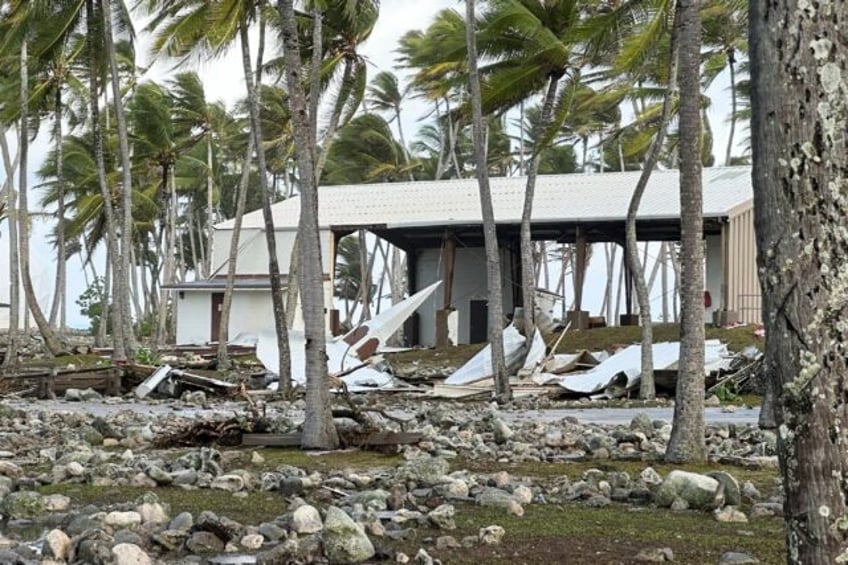 This handout from the U.S. Army Garrison-Kwajalein Atoll in the Marshall Islands shows the steeple of the Roi-Namur church resting on the ground after a surge of giant waves swamped the island