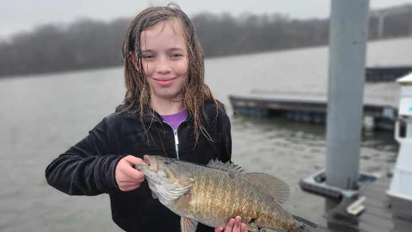 Lucy-fishing-in-the-rain