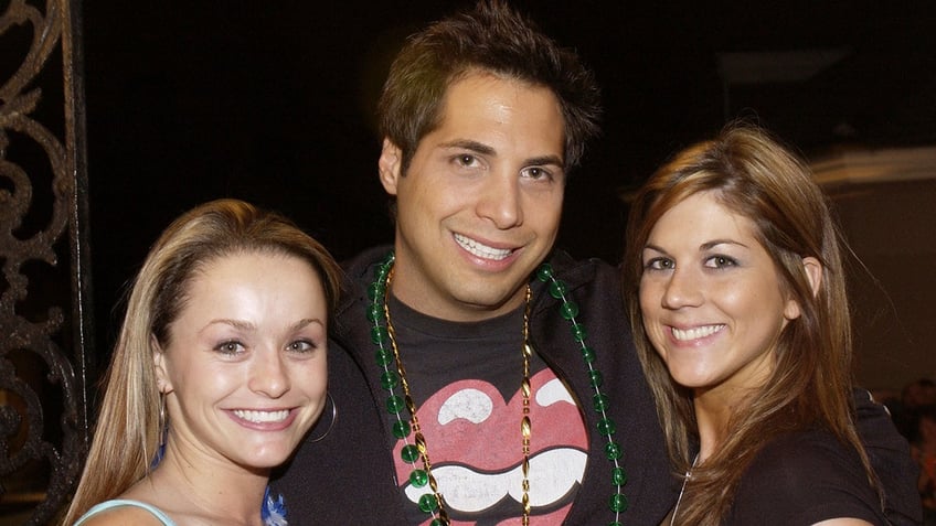 Joe Francis and two women at the Girls Gone Wild and Coochie Power Mardi Gras 2004 Weekend