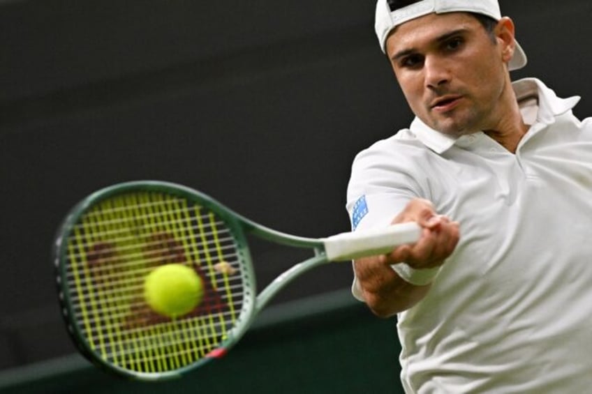 American Marcos Giron won his first ATP title on Sunday at the Hall of Fame Open on grass