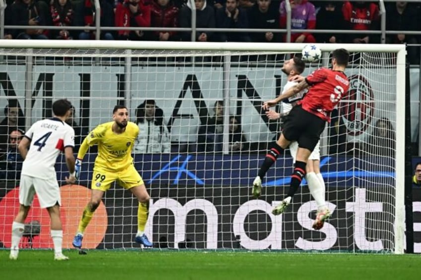 giroud sinks psg to reignite milans champions league bid