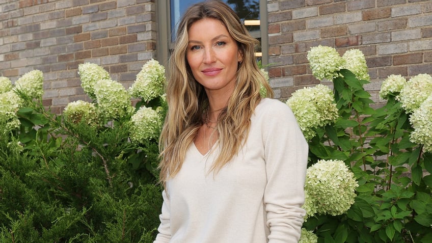 Gisele Bundchem wearing white