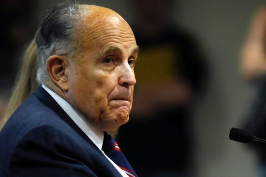 giuliani scoffs at georgia vote case as he prepares to surrender