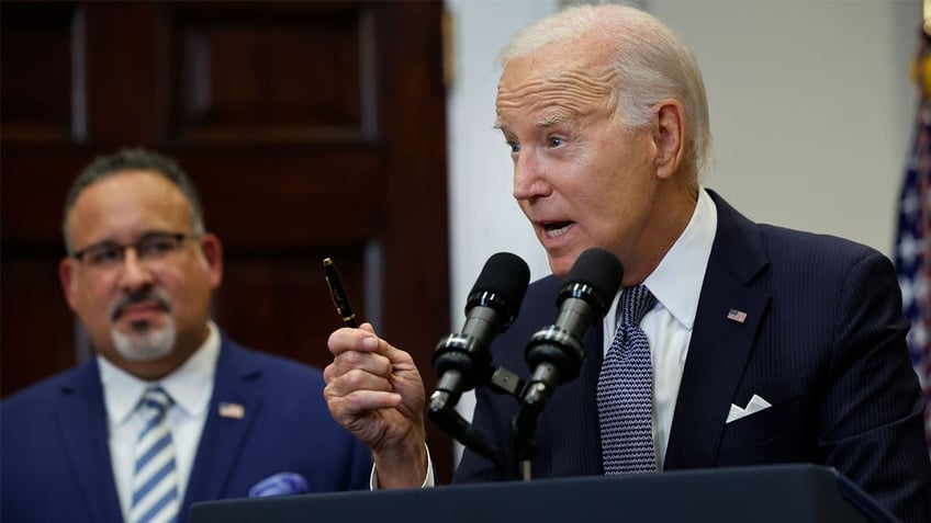 giving government money away university of south carolina students divided over biden student loan handout