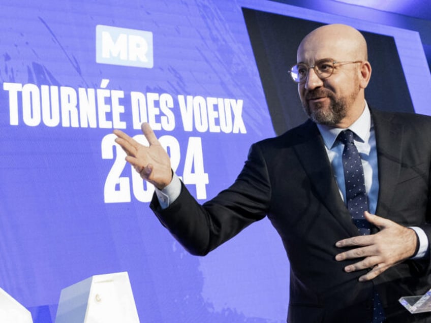 President of the European Council Charles Michel gestures as he delivers a speech at the national New Year congress of French-speaking liberal party MR (Mouvement Reformateur) in Louvain-la-Neuve on January 7, 2024. Charles Michel has announced on January 7, 2024 he will step down as European Council president after running …